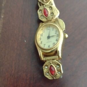 Elegant Gold and Red Women's Watch